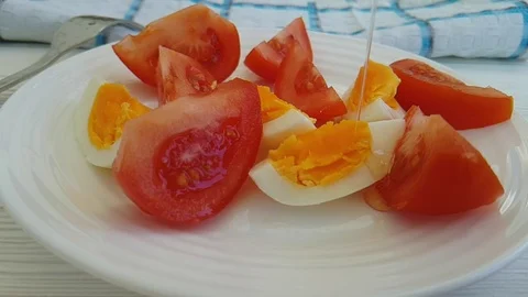 Lettuce tomato egg oiled Stock Footage 87402368