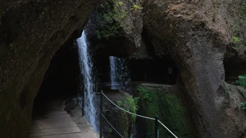 Levada Nova waterfall, Lombada, a steady shot captures the continuous flow of Stock Footage 345227677