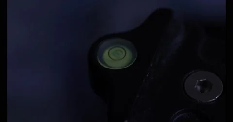 Level bulb balanced to check the tripod or equipment level Stock Footage 166636640