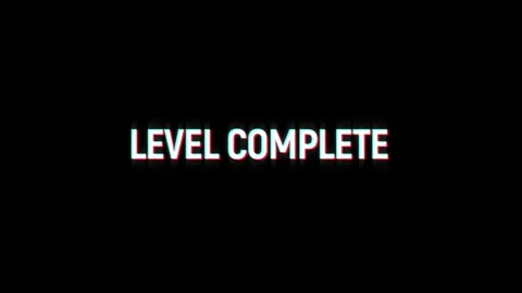 Level complete animation of looped text glitch video game screen effect Stock Footage 313060735