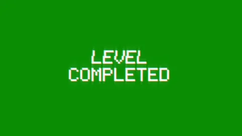 Level completed animation of looped text glitch video game screen effect Video stock 313060753