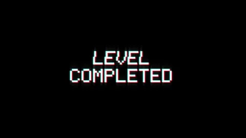 Level completed animation of looped text glitch video game screen effect Stock Footage 313060758