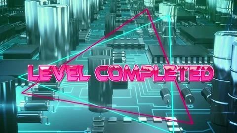 Level completed text on neon triangles against close up of microprocessor Stock Footage 158414166