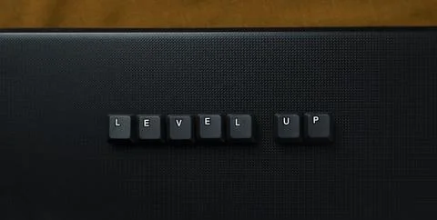 Level Up Growth And Progress Concept With Keyboard Keys Stock Photos