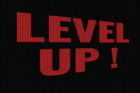 Level UP red word on dark screen Stock Photos
