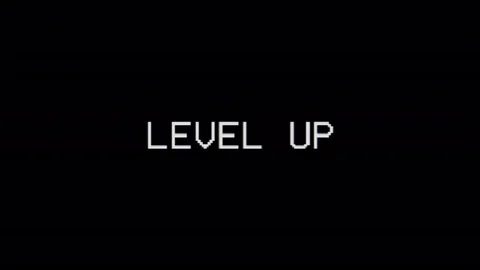 Level up words on old tv glitch interference screen Stock Footage 111377402