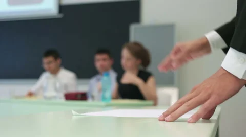 Leveled view at young student making hand gestures while explaining his view Stock Footage 56909989