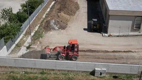 Leveling and land accumulation on a construction site Stock Footage 194507543