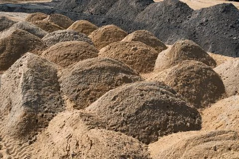 Leveling the ground. empty construction site of a residential area with a pil Stock Photos