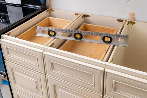 Leveling kitchen cabinets Stock Photos