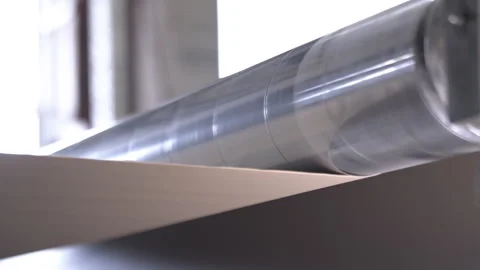 Leveling machine creates flat surface of web in workshop Stock Footage 303103347