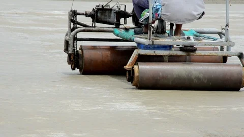 Leveling shallow pond Video stock 100527189