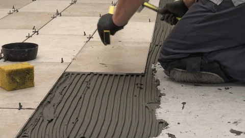 Leveling tiles Stock Footage 111866827