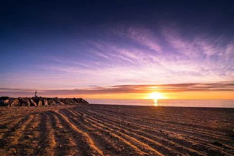 Lever de soleil sur la plage de Barcarès, France Stock Photos