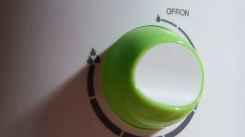 Lever, handle or on off button on a household appliance Stock-Footage 85264674