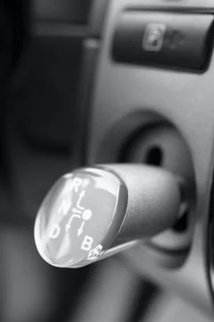 Lever of switching  gear-box in car Stock Photos