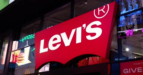 Levi's store on Times Square in Manhattan at night. People enjoying sightseeing Stock Footage 219883586