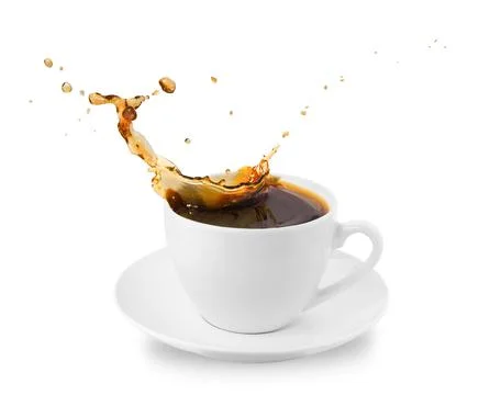 Levitating drink. Isolated on white background. Cup with saucer with splash o Stock Photos