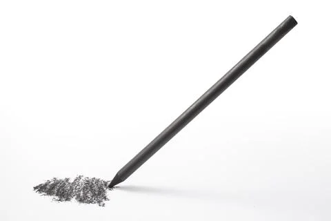 Levitating graphite sharp pen crayon strokes on white paper, soft focus clo.. Stock Photos