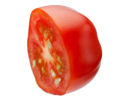 Levitating halves of cherry tomatoes Stock Photos