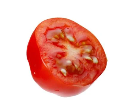 Levitating halves of cherry tomatoes Stock Photos