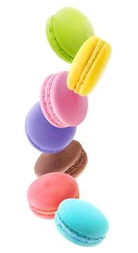 Levitating macaroons of different colors, vertical isolated on white backgrou Foto stock