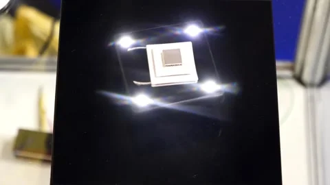 Levitation of a glowing processor in a magnetic field Stock Footage 249527065