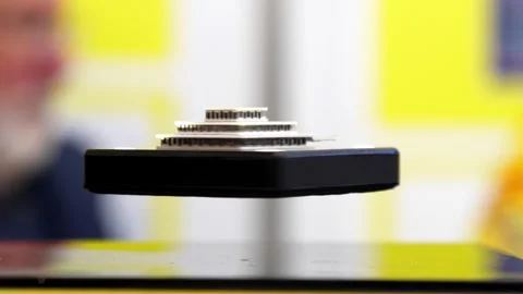 Levitation of an object in a magnetic field Stock Footage 249527079
