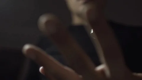 Levitation ring in the hand of the magician. Ring hangs in the air. The trick Stock Footage 89581687