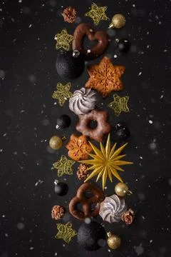 Levitation of sweets on a black background Stock Photos