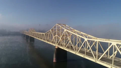 Lewis and Clark Bridge Spanning Indiana - Kentucky on the Ohio River Drone View Stock Footage 142803503
