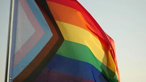 LGBT Flag The rainbow pride flag represents the LGBTQ+ community Stock Footage 232906647