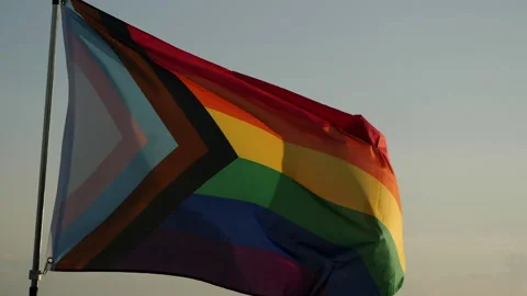 LGBT Flag The rainbow pride flag represents the LGBTQ+ community Video stock 232906697