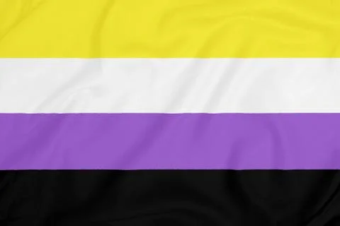 LGBT Non-binary pride community flag on a textured fabric. Pride symbol Stock Photos