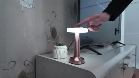 LHand Touching Modern LED Lamp to Change Light Color Temperature Видео 332226934