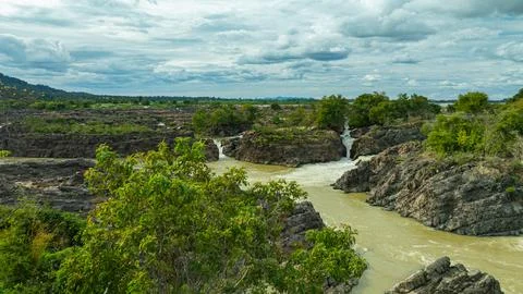 Li Phi Waterfall Scenic Sunset Over Li Phi Waterfall in Mekong River Stock Photos