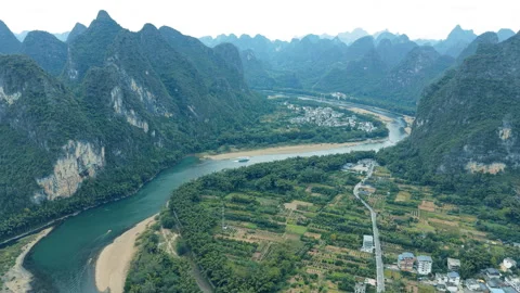 Li River(Li Jiang) and Yangshuo Karst Mountains Aerial View, Guilin, China Stock Footage 323977346