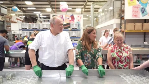Lib Dem leader makes bath bomb during visit to Poole Stock Footage 313343793