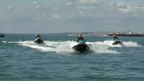 Lib Dem leader Sir Ed Davey rides jet-ski in Brighton Stock Footage 284536578
