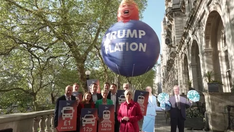 Lib Dems inflate giant balloon of Trump as they call for an end to 'Trumpflatio Stock Footage 333242396
