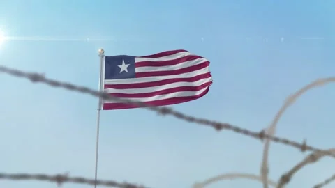 Liberia flag behind border Stock-Footage 137427402