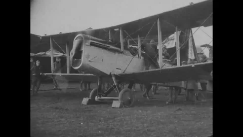 A Liberty plane move slowly over the ground prepare to ascend 1917-1918 Stock Footage 98957598
