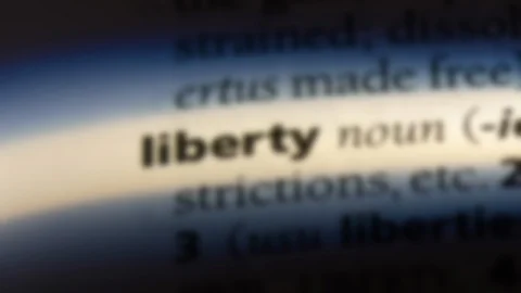 Liberty word in a dictionary. Video stock 99562184