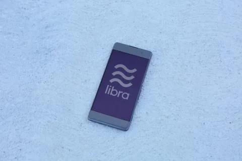 Libra logo on a smartphone screen Foto stock