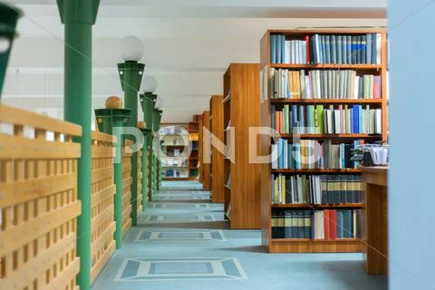 Library bookshelf closeup with letter Stock Photos