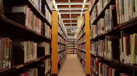 Library Bookshelves Dolly In Stock Footage