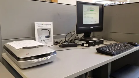 Library Computer &amp; Scanner Stock Footage 93811712