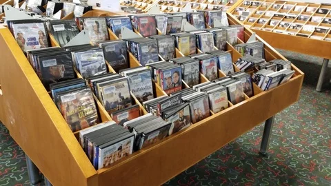 Library DVD Shelf 3 Stock Footage 93811695