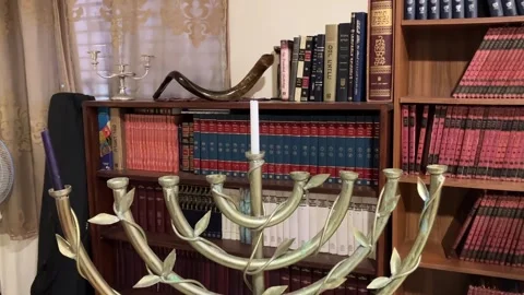 Library in the synagogue Shofar on the shelf. Stock Footage 261331534