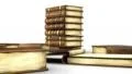 Library table full of books isolated on white HD Footage